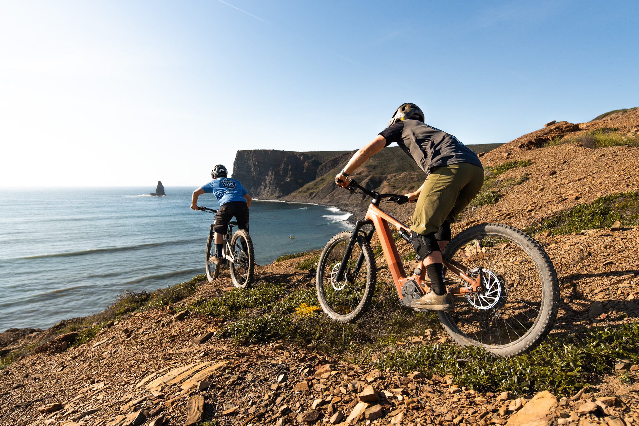 Mountain bike riders on the Coastal Explorer tour with ocean views in the Algarve
