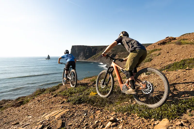 Mountain bike riders on the Coastal Explorer tour with ocean views in the Algarve