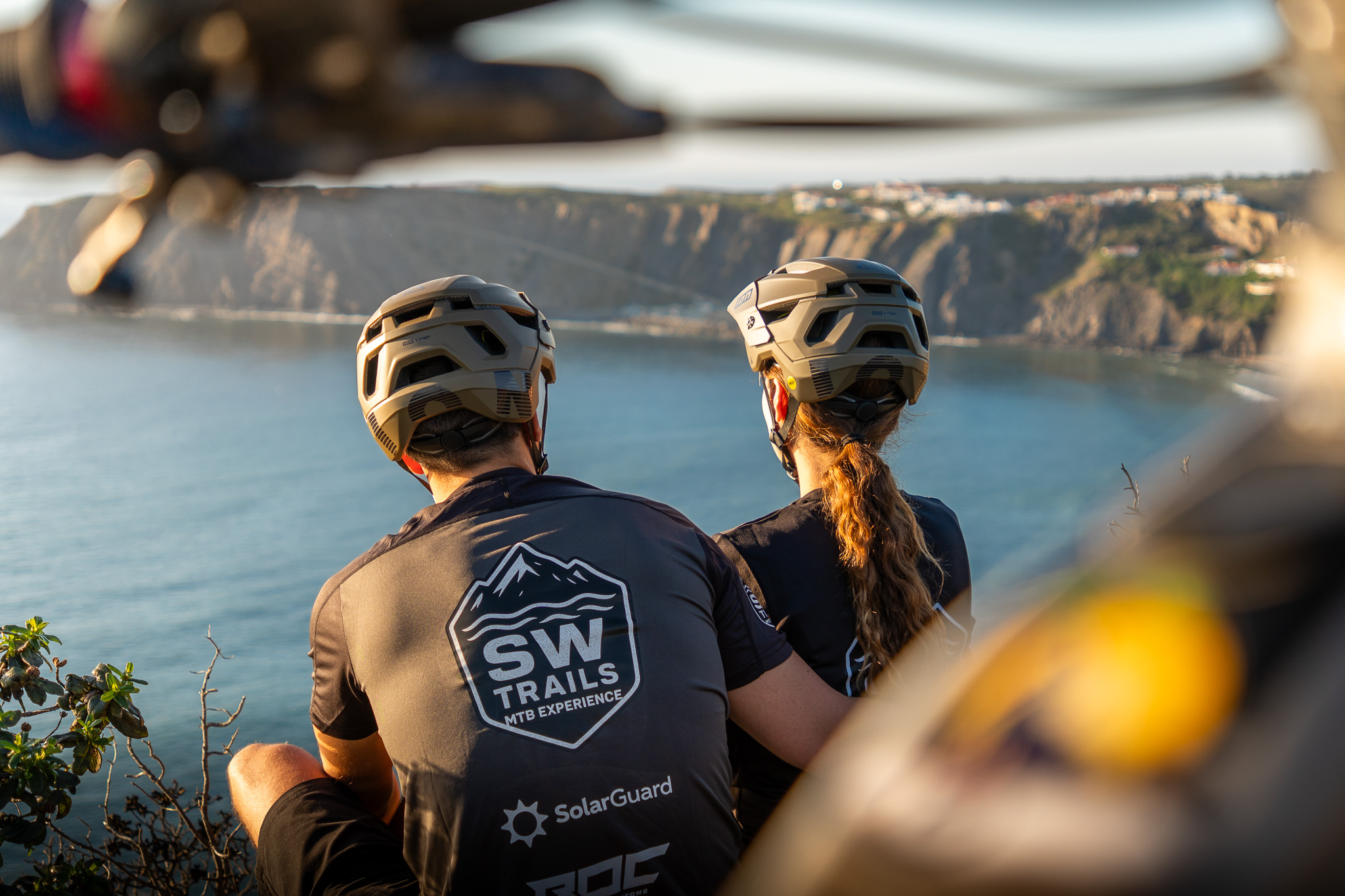 Mountain bike riders on coastal trails in the Algarve